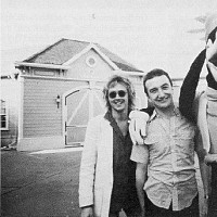 Roger Taylor a John Deacon